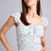بلوز زنانه بدون آستین فیتد گل‌دار دFacto مدل 3479700 — آبی روشن Defacto